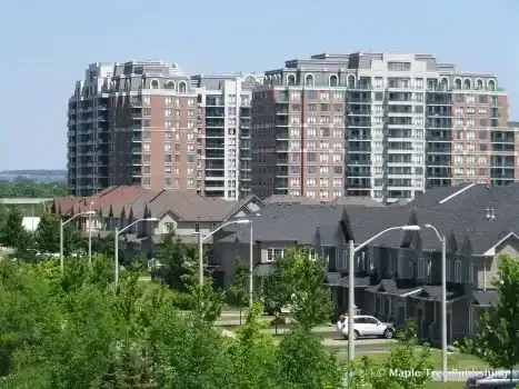 High-rise residential condominium development in the urban Langstaff community.