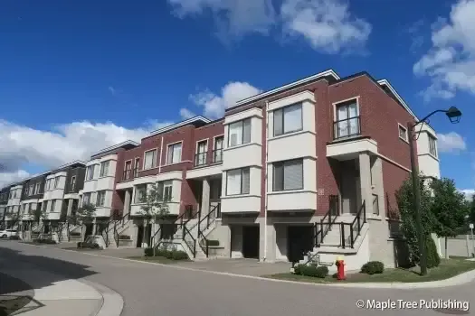 Streetscape of executive townhomes in the family-friendly Doncrest area.