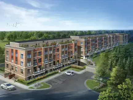 Modern multi-unit residential building overlooking greenery in the Mill Pond area.