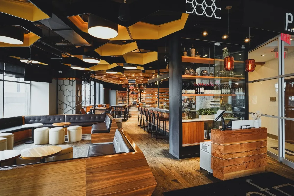 Stylish interior of a contemporary restaurant in Waterloo with wood accents.