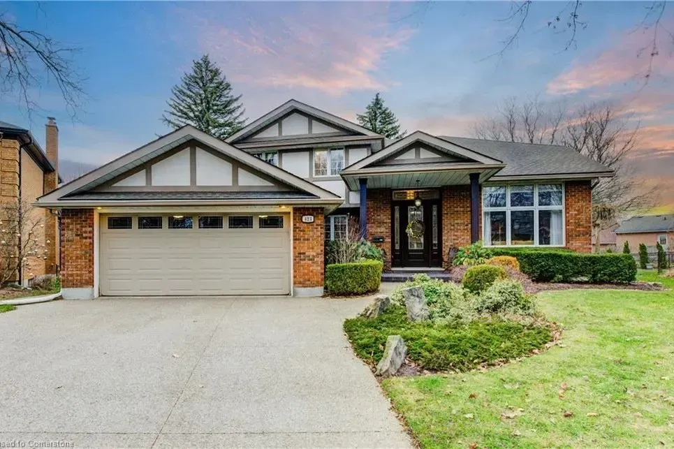 Large family home with manicured lawn in the Beechwood neighborhood.