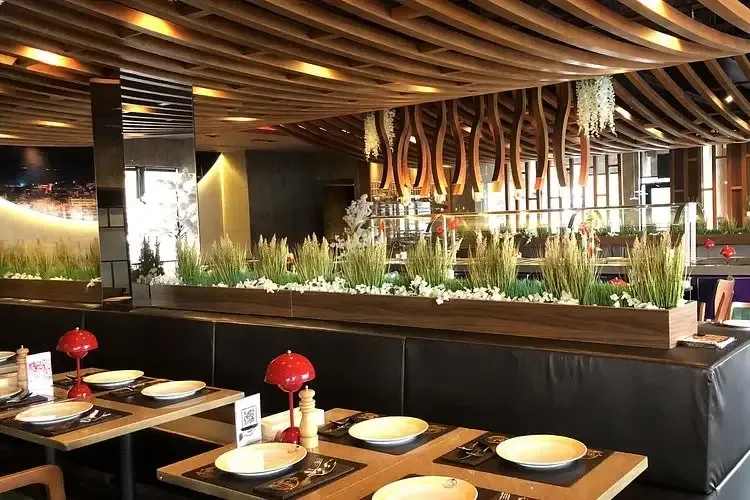 Elegant dining area featuring wooden lattice ceilings at AGHA Turkish Restaurant.