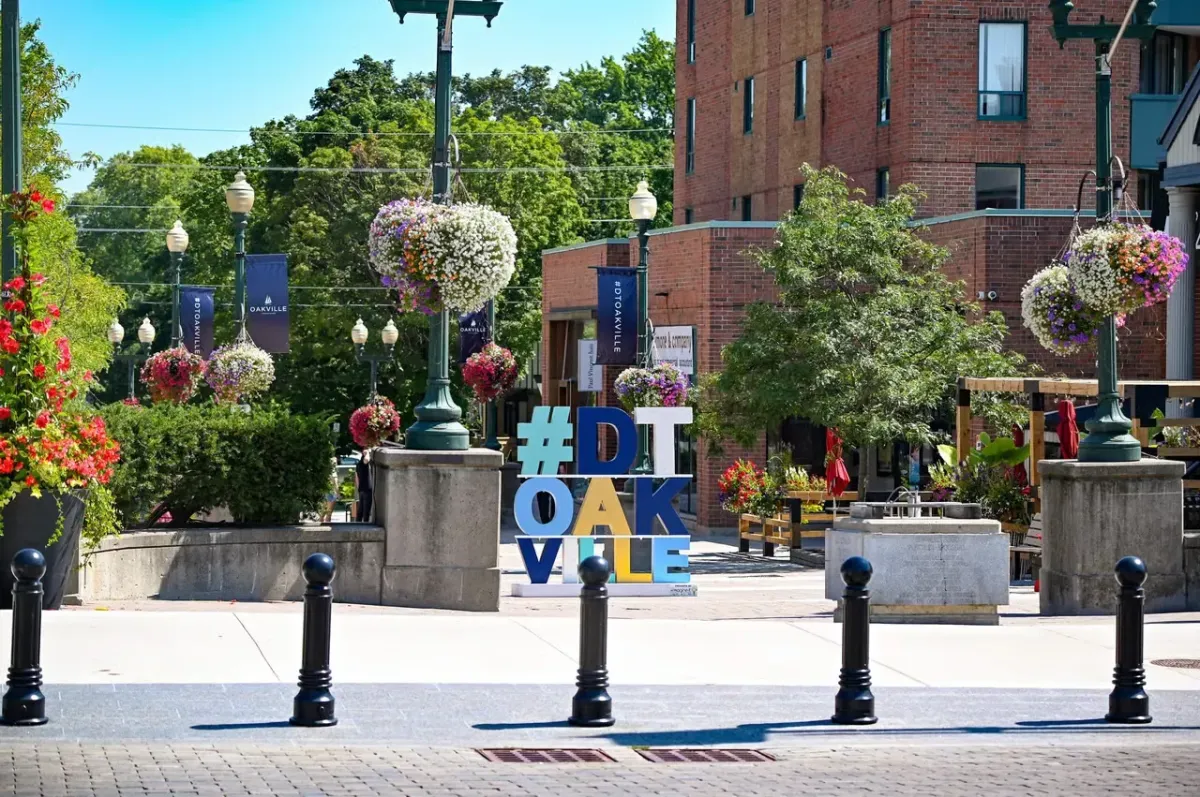 The town square area of historic Old Oakville with community seating.