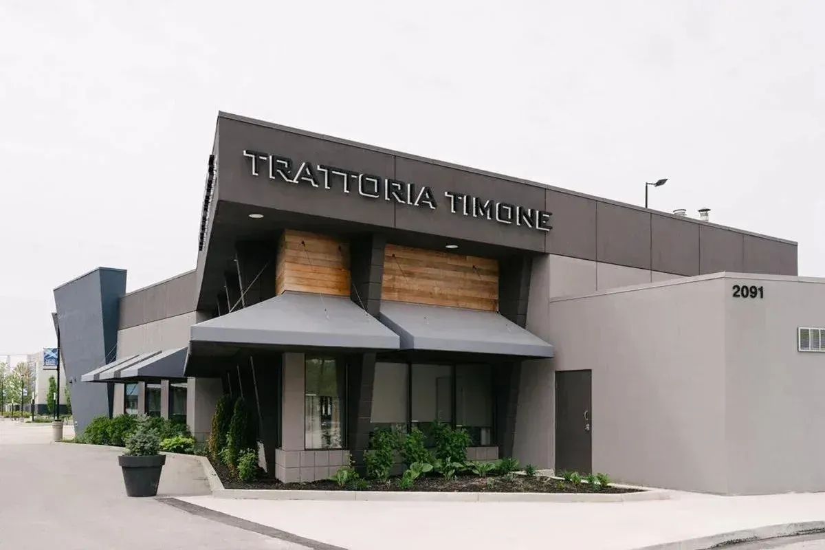 Modern sleek exterior of Trattoria Timone Ristorante, an Italian dining destination in Oakville.