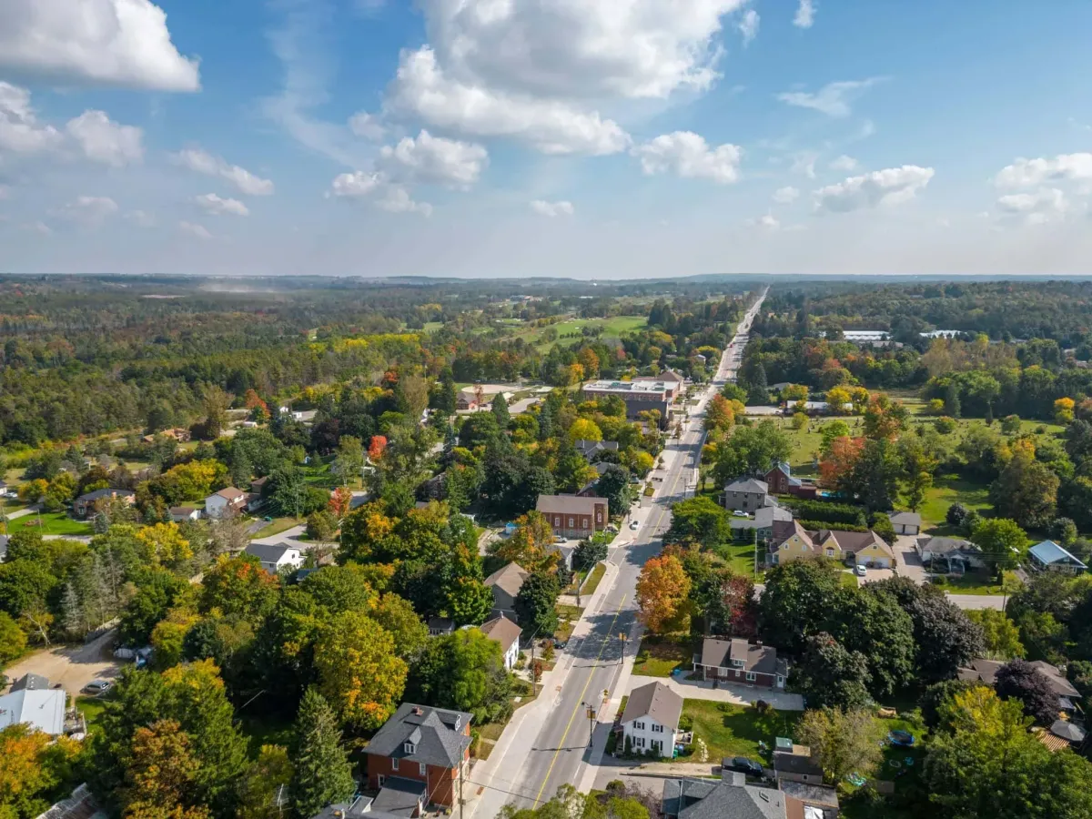 A wide aerial view of the lush greenery and rural roads surrounding Alton, Ontario.