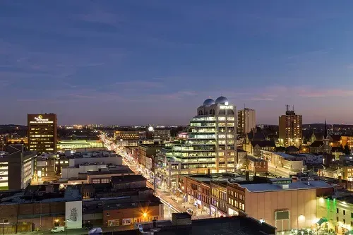 Downtown Kitchener city lights at dusk highlighting the urban lifestyle and real estate in the city core.