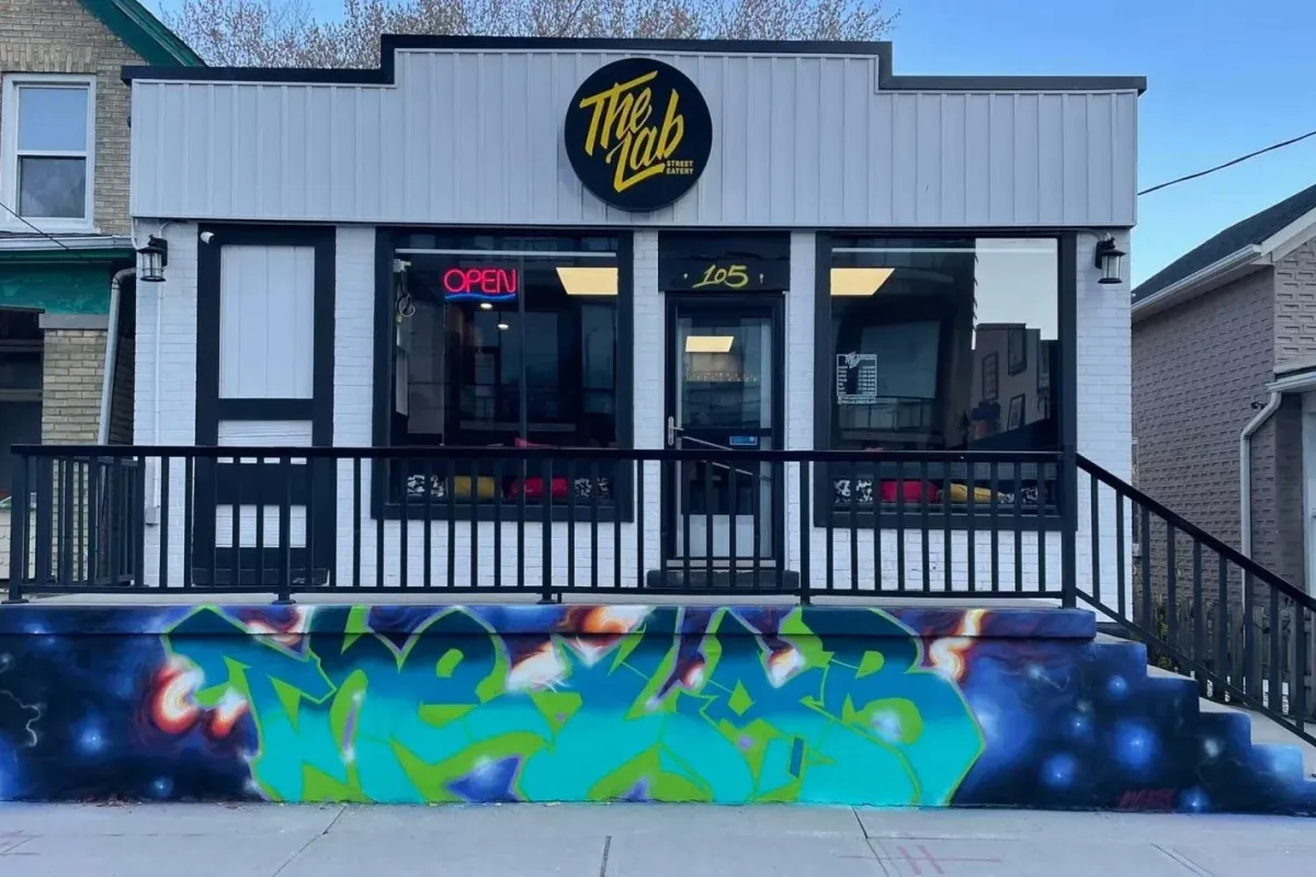 Street-level view of The Lab Street Eats in Kitchener, known for creative comfort food and a vibrant local vibe.