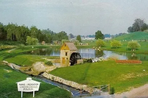Scenic view of the historic clock tower and monument at Victoria Park, a top outdoor attraction in Kitchener.