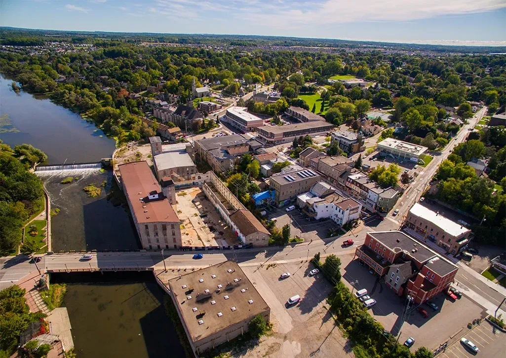 Aerial view of Hespeler Village showing the historic mill buildings and the Speed River.