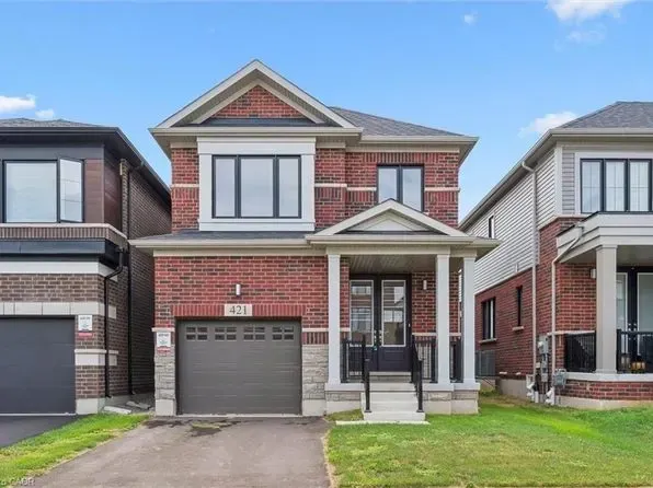 A stunning multi-story luxury brick home in the historic Blair neighborhood of Cambridge.