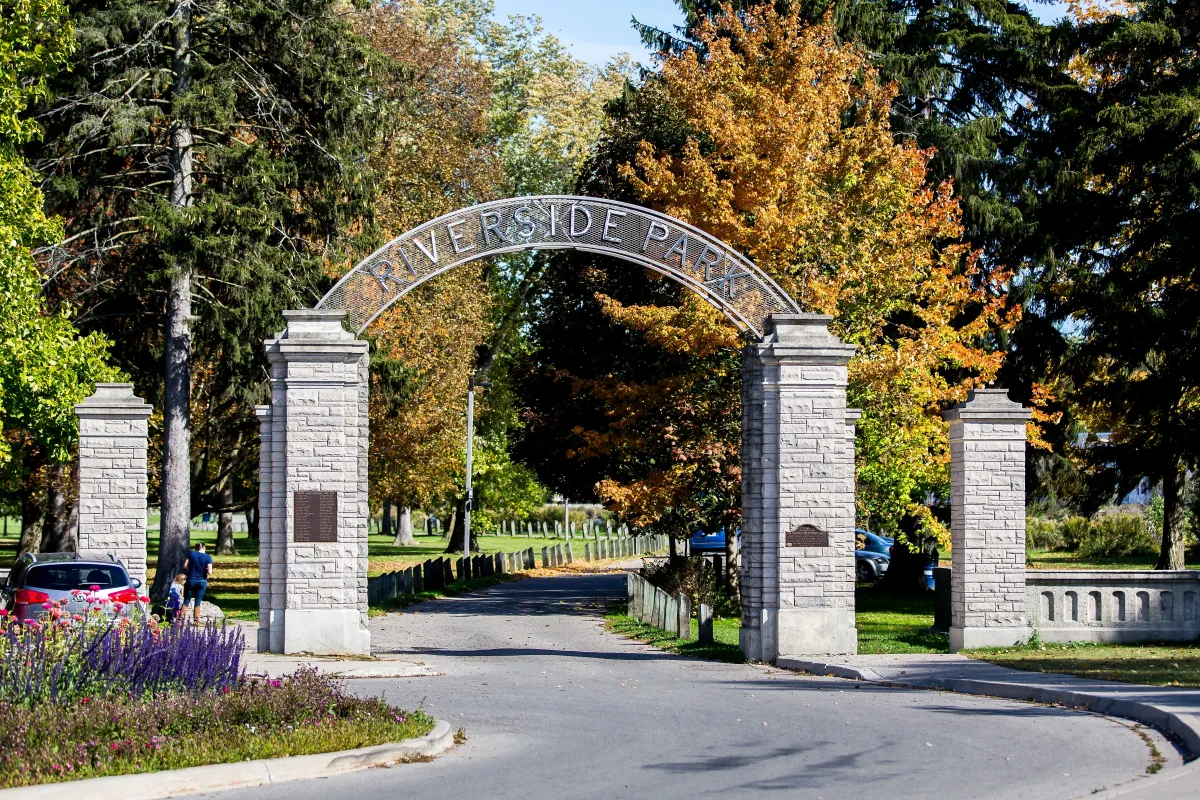 The iconic stone archway entrance to Riverside Park, a major landmark in Preston, Cambridge.