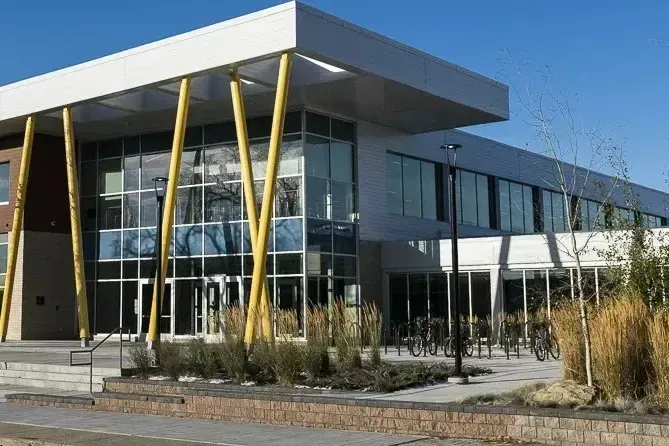 Modern exterior of a Calgary educational institution, showcasing the city's academic infrastructure and learning centers.