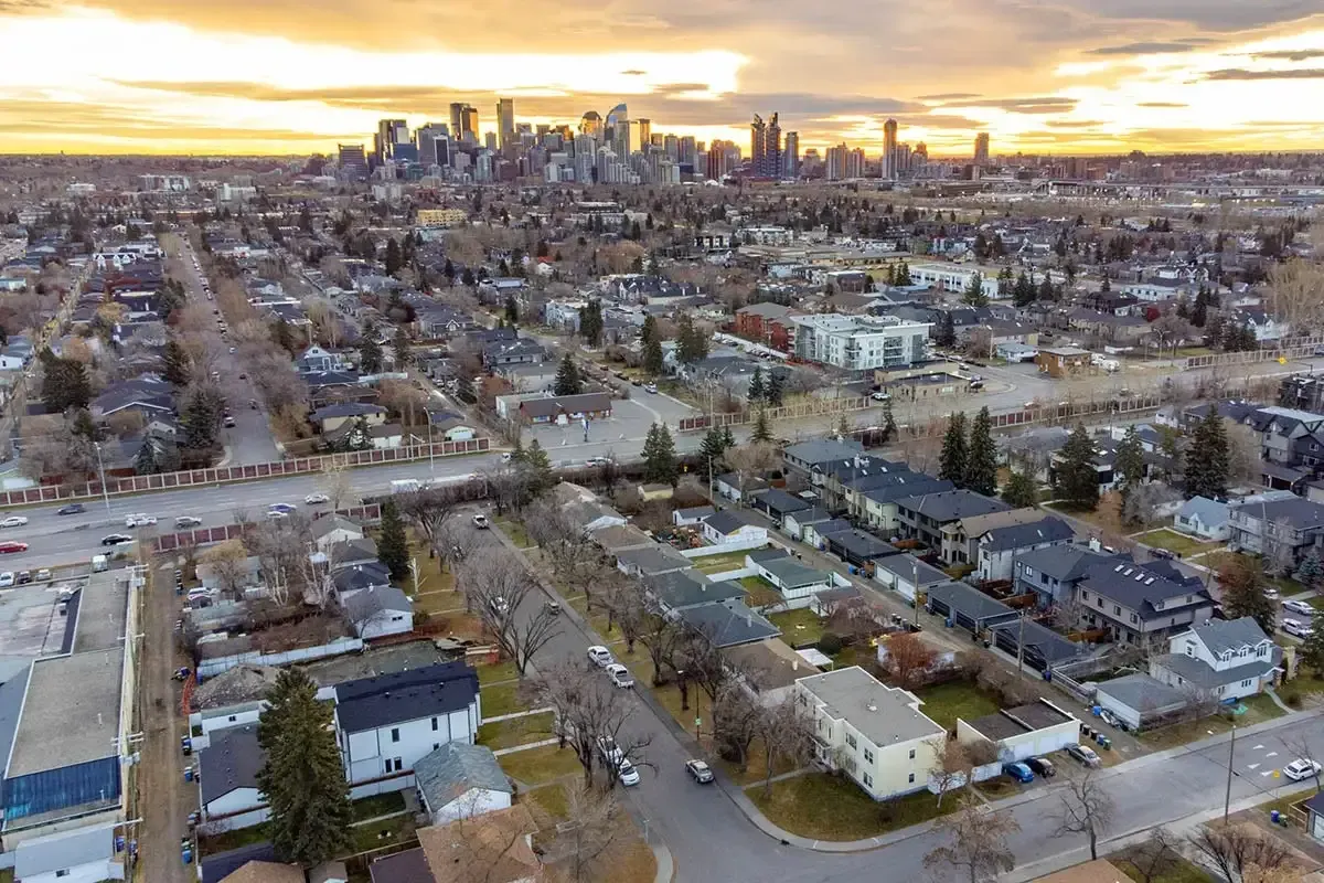 Elevated view of a residential neighborhood in Calgary, highlighting local housing and community layouts.