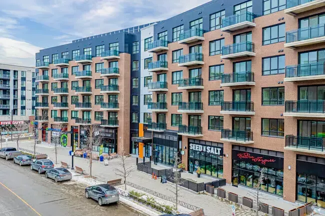 Modern low-rise condominium building in the Varsity neighborhood, conveniently located near the university.