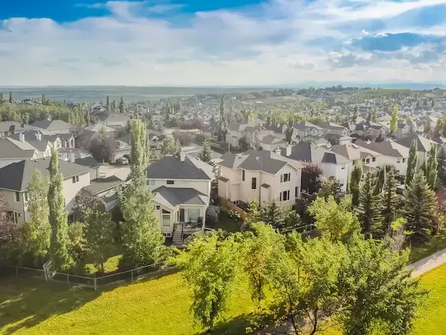 Aerial view of Signal Hill, highlighting the residential layouts and proximity to shopping centers.
