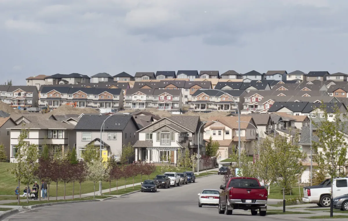 Wide-angle view of suburban residential streets and homes in the Saddle Ridge area of NE Calgary.
