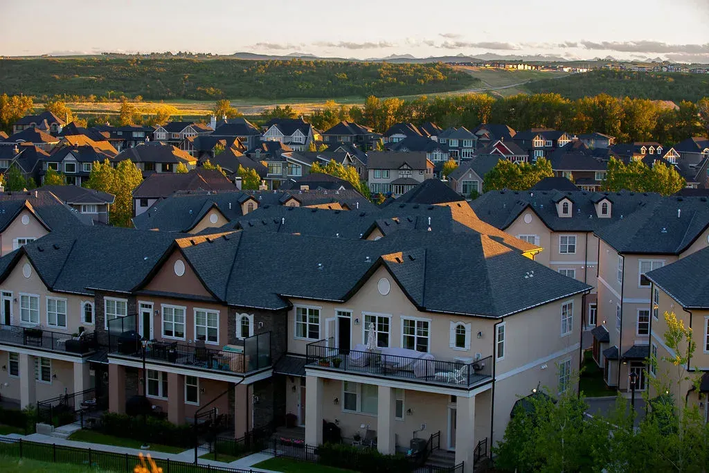 Established residential street in Cranston, featuring mature landscaping and varied home styles.