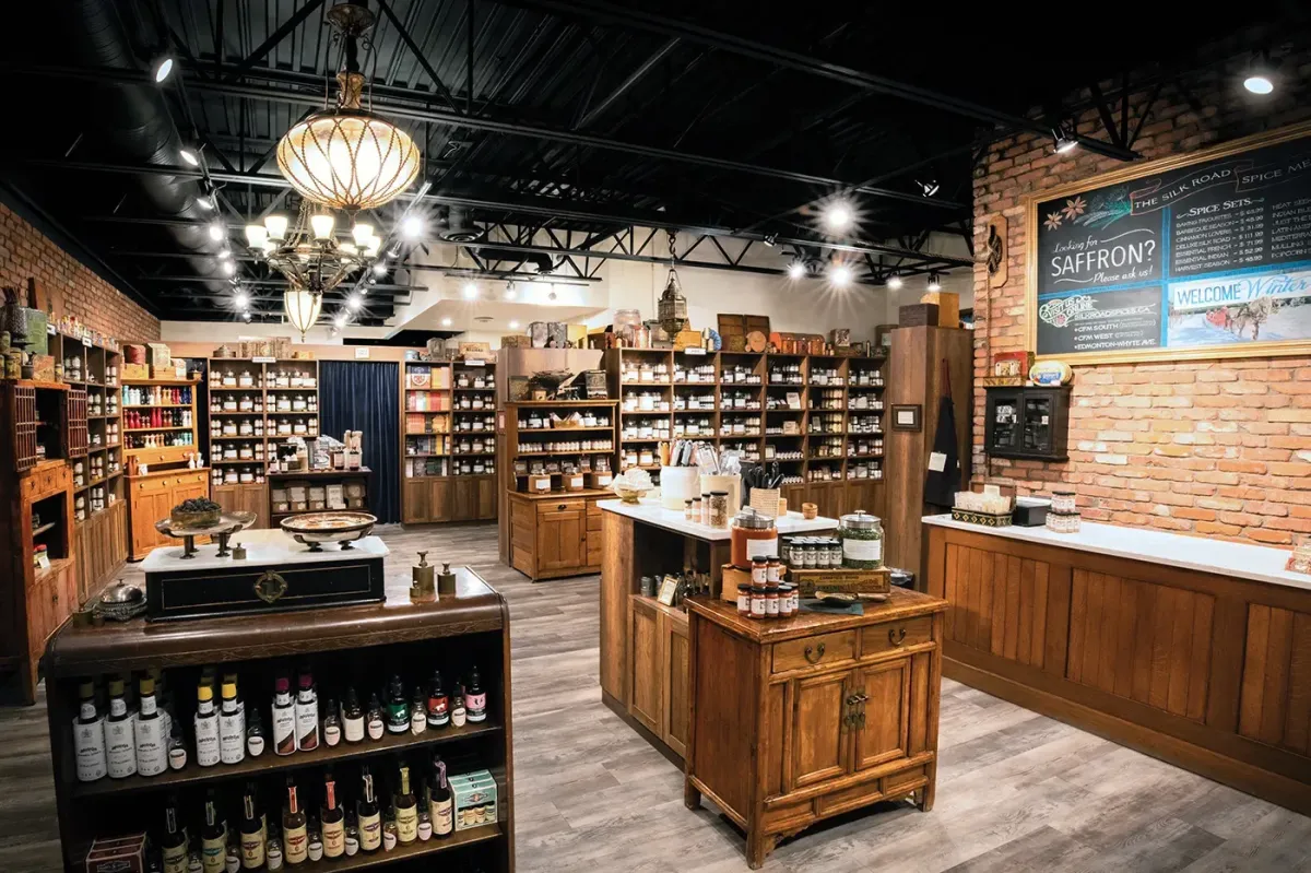 Interior of The Silk Road Spice Merchant in Calgary, showcasing a wide variety of aromatic spices and herbs.