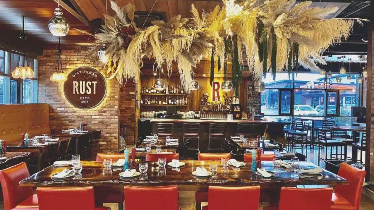 Modern exterior and seasonal outdoor patio of Rust Bistrobar located at Walkers Line and Upper Middle Road in Burlington.