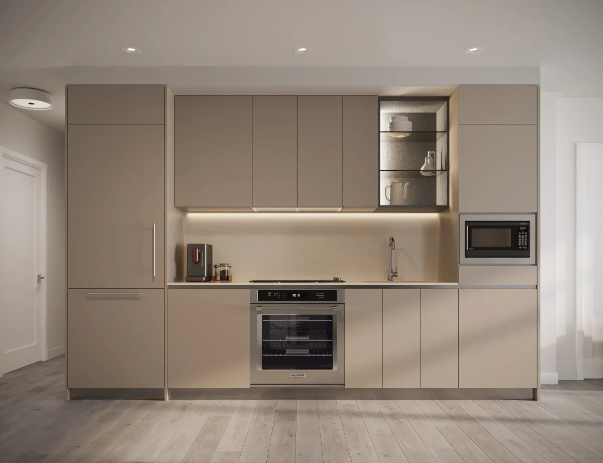 Modern open-concept kitchen at 875 The Queensway Maxium Condos featuring integrated appliances and minimalist cabinetry.