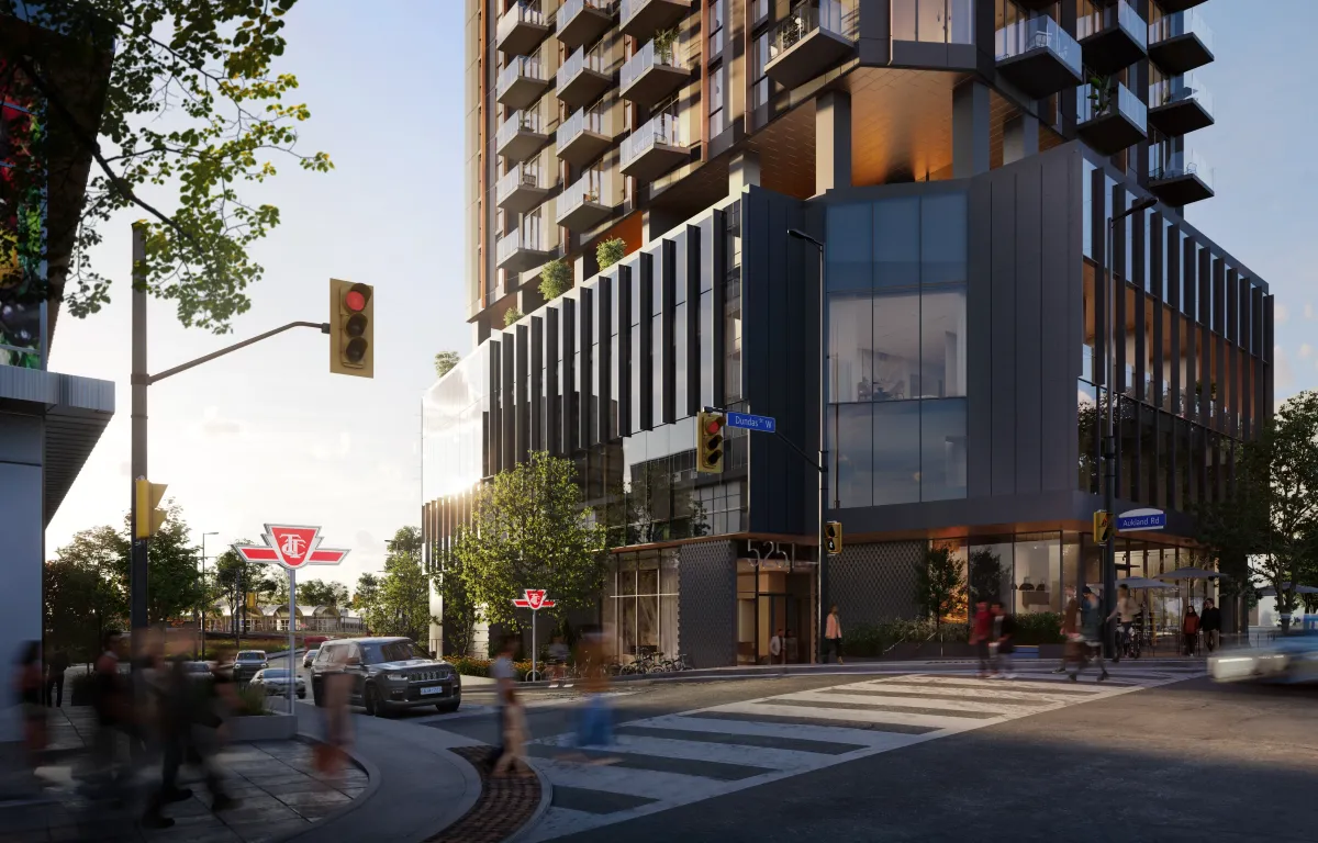 Street-level view of Kipling Station Condos' red-brick podium and retail cafe space.