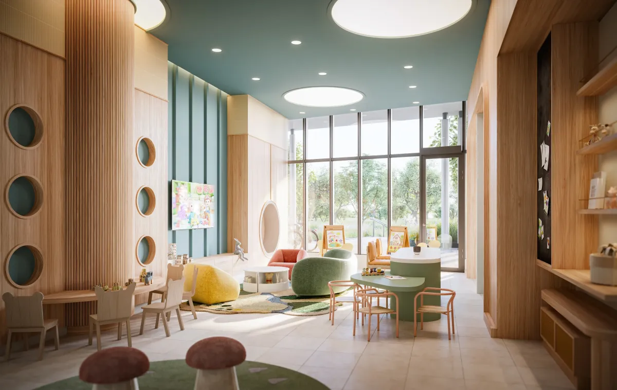 Modern and vibrant indoor children's playroom and learning space at The Clove residences.