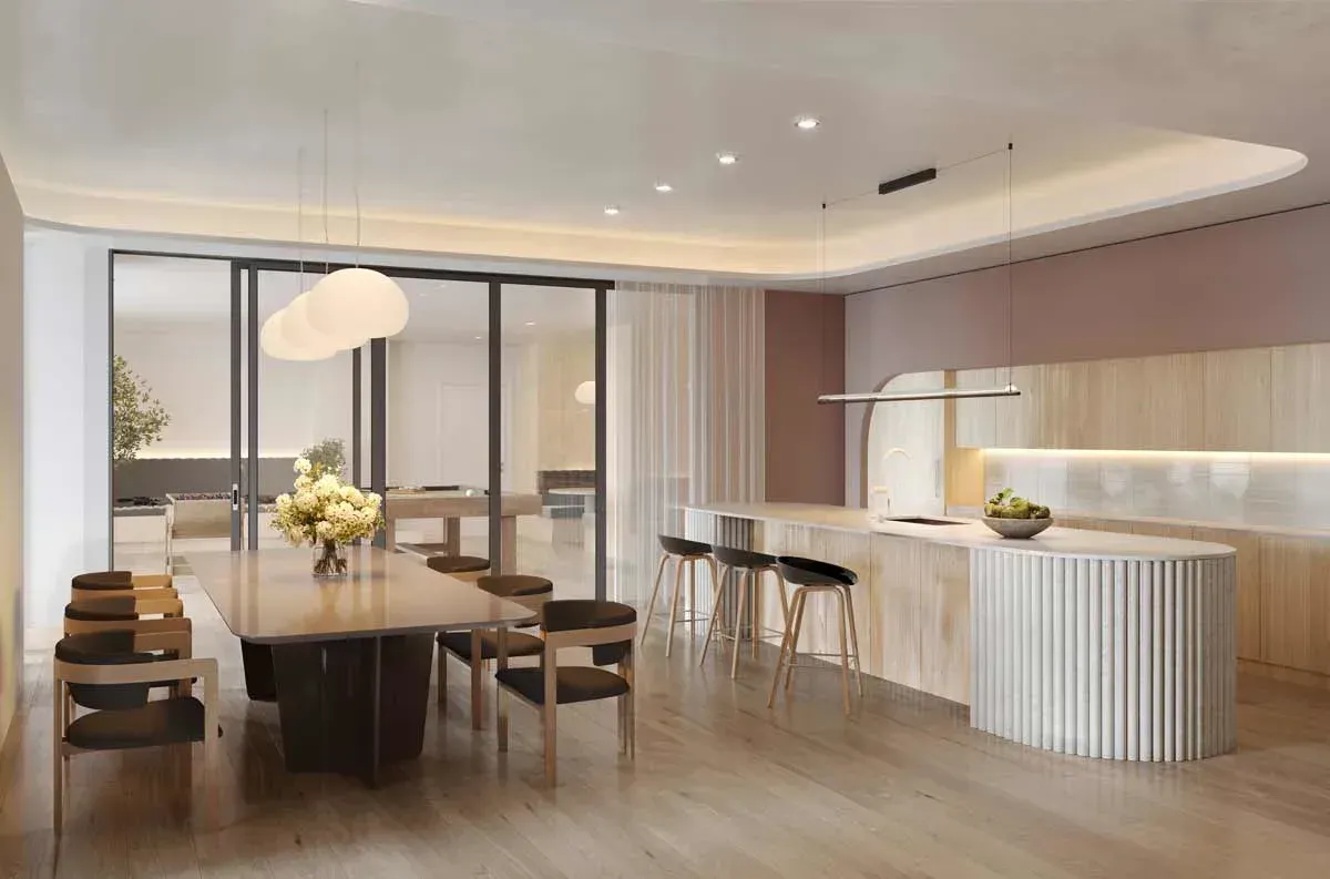 Sophisticated resident social lounge and private dining room with modern finishes at Joya Condos.