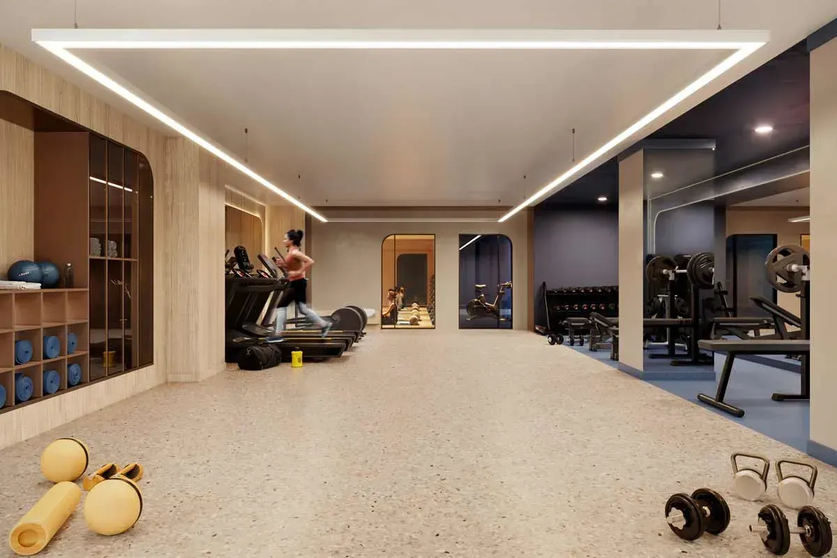 Bright open-concept living area and modern kitchen with balcony views at Joya Condos, Etobicoke.