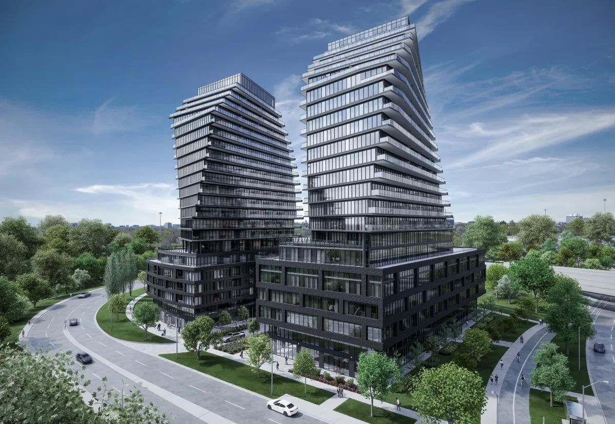 Ground-level perspective of the modern glass facade of 9Hundred Condos in Etobicoke.