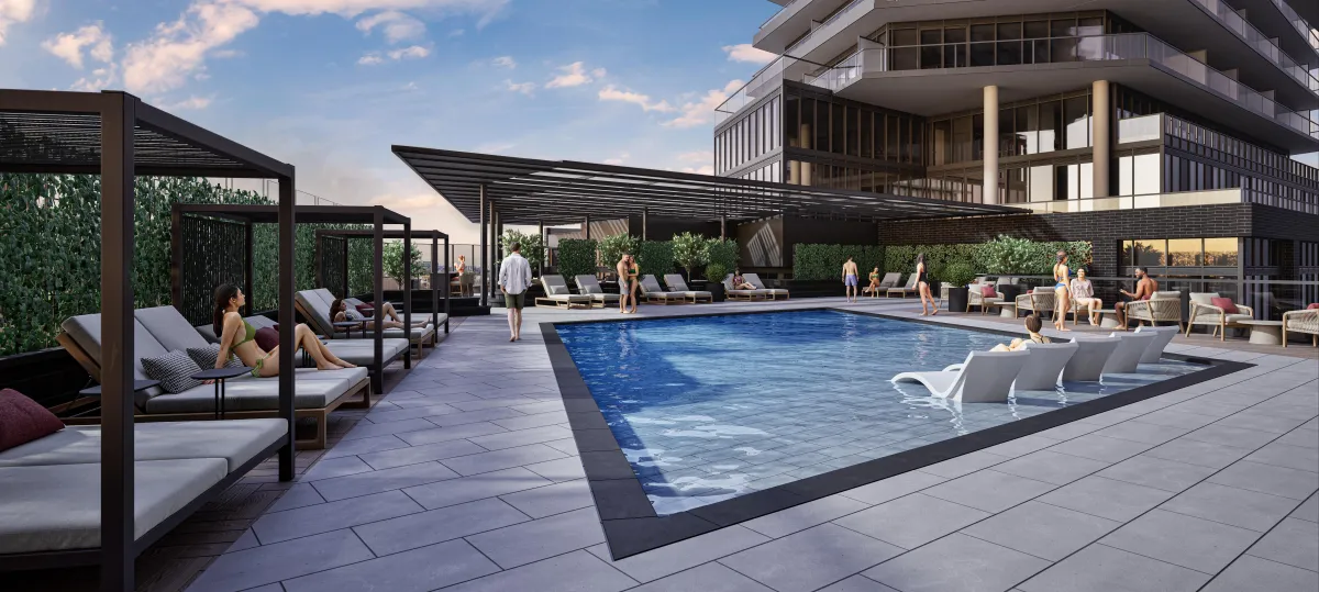Luxury outdoor swimming pool and lounge deck area at 9Hundred Condos.