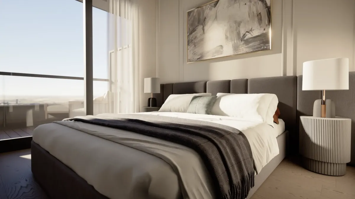 Spacious master bedroom with neutral tones and large windows at 9Hundred Condos.