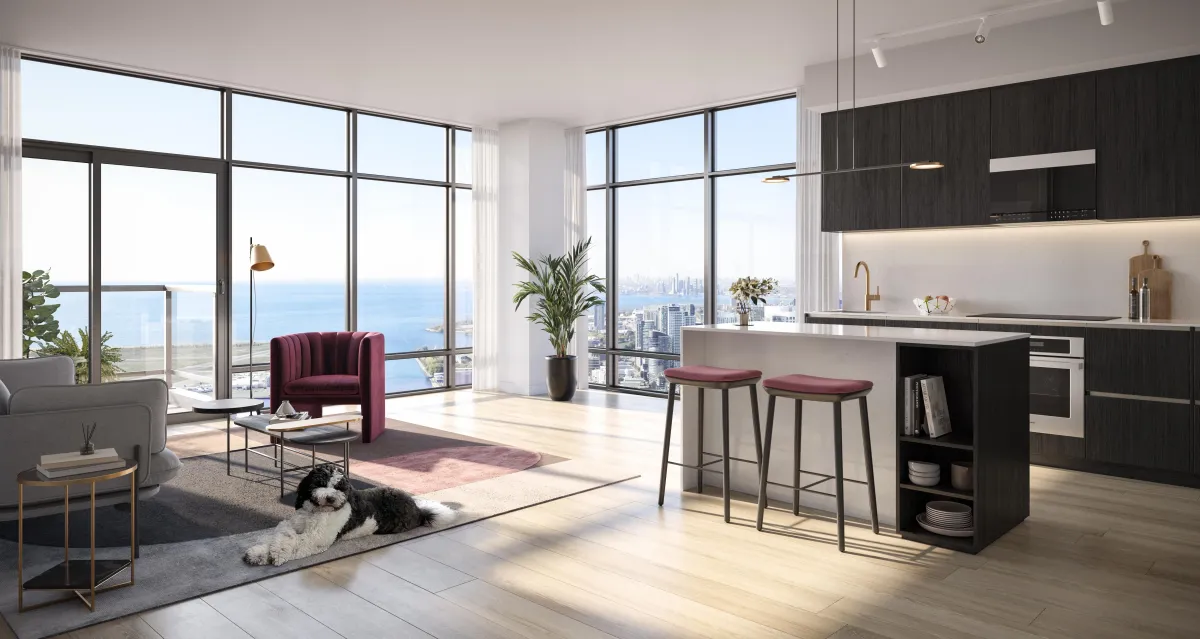 Modern open-concept kitchen and living area with lake views at Q Tower Condos.