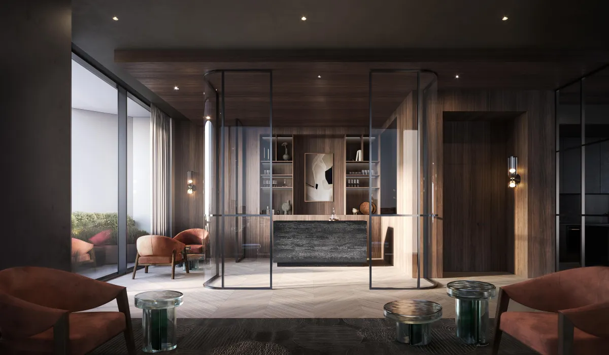 Moody and elegant resident lounge with wood paneling and designer furniture at One Delisle.