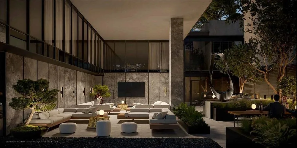 Bright and airy social lounge with modern curved furniture and terrace access at Allure Condos.