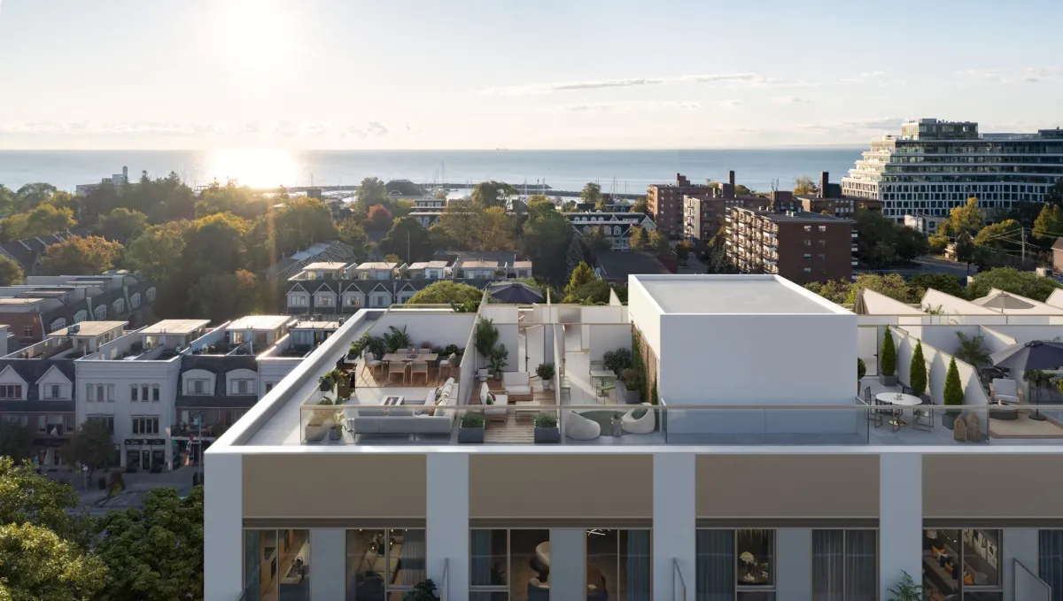 Exclusive resident rooftop terrace with lounge seating and panoramic views of Lake Ontario at Claystone.