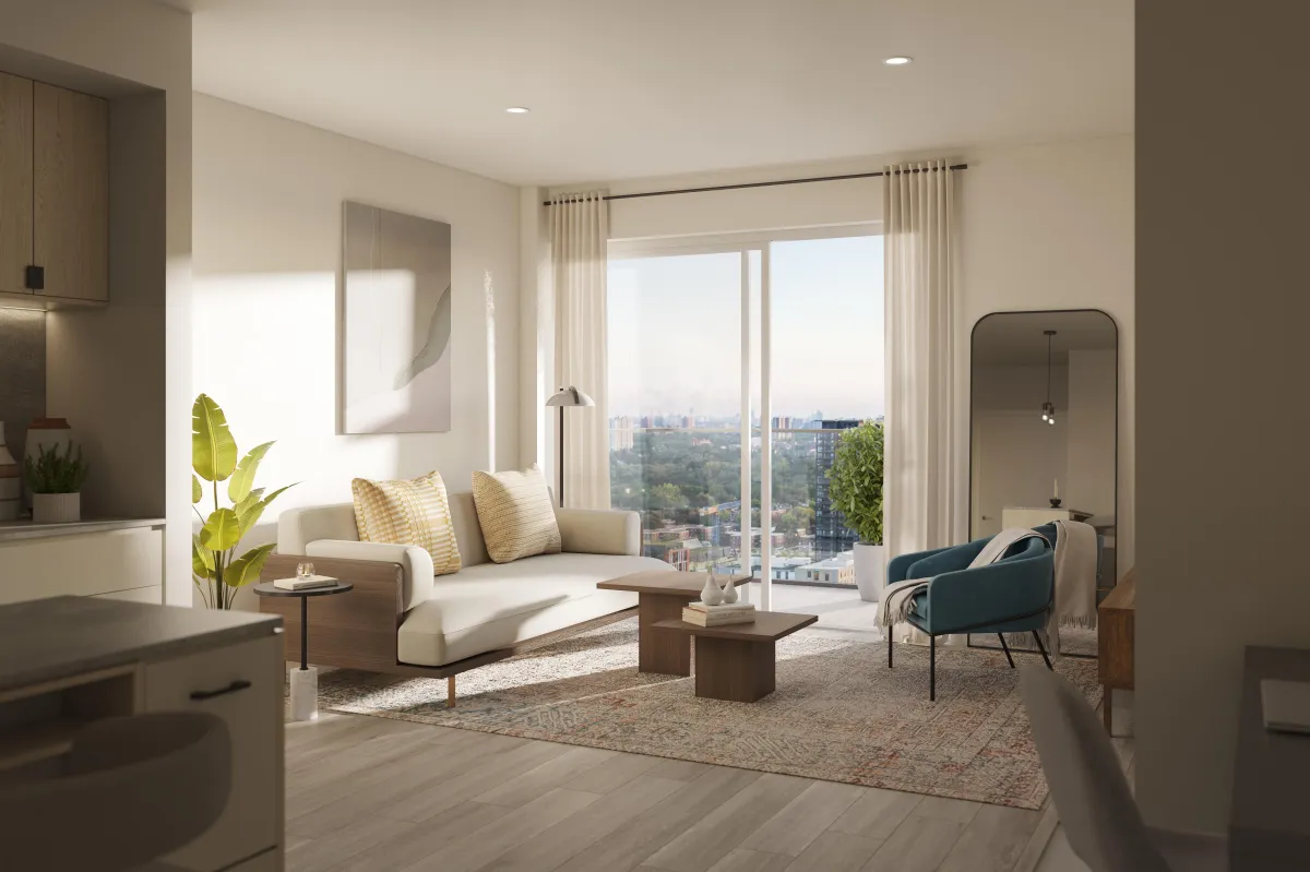 Light-filled open living room with large windows leading to a private terrace at Westbend Residences.