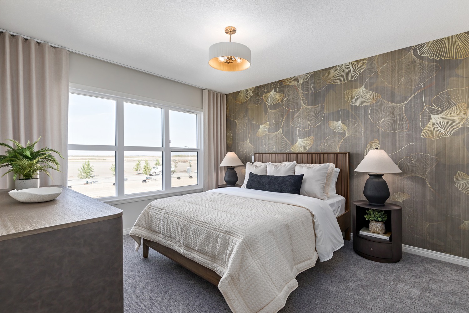 High-end kitchen with integrated appliances and elegant dining space at 9Hundred Condos.