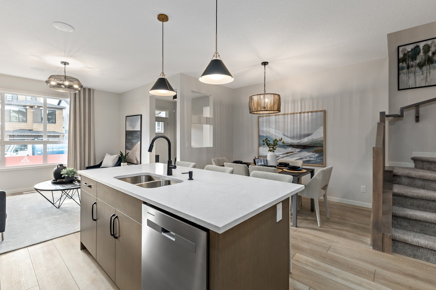 Bright suite interior featuring contemporary finishes and panoramic city views at 9Hundred.