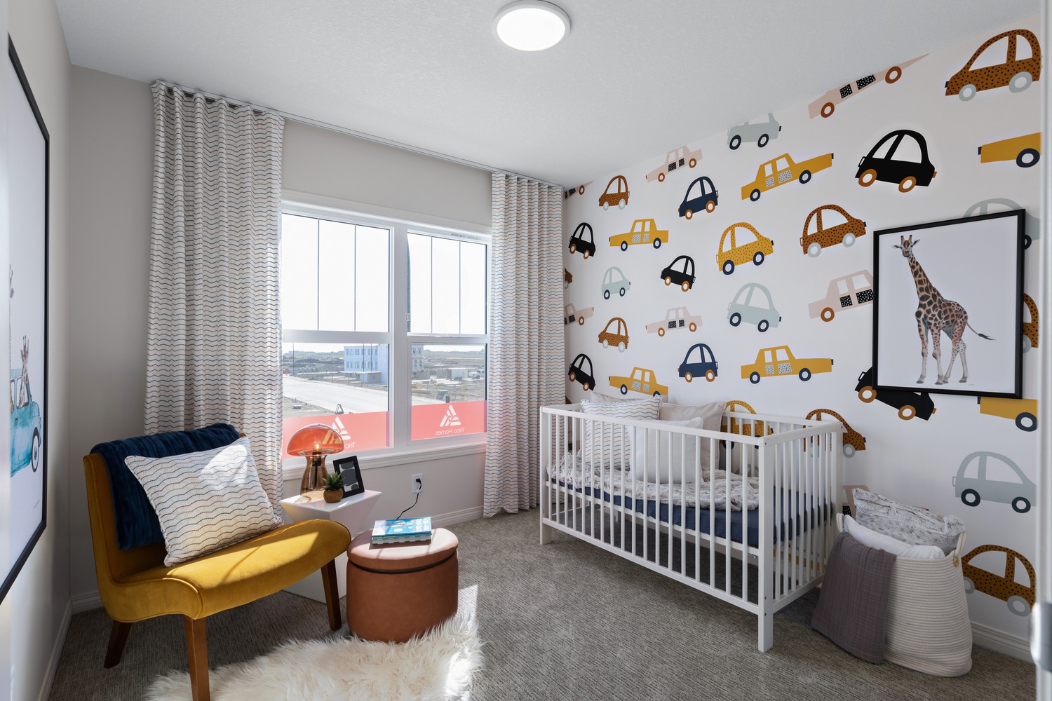 Bright suite interior featuring contemporary finishes and panoramic city views at 9Hundred.