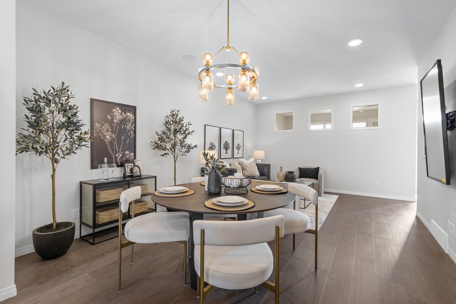 High-end kitchen with integrated appliances and elegant dining space at 9Hundred Condos.