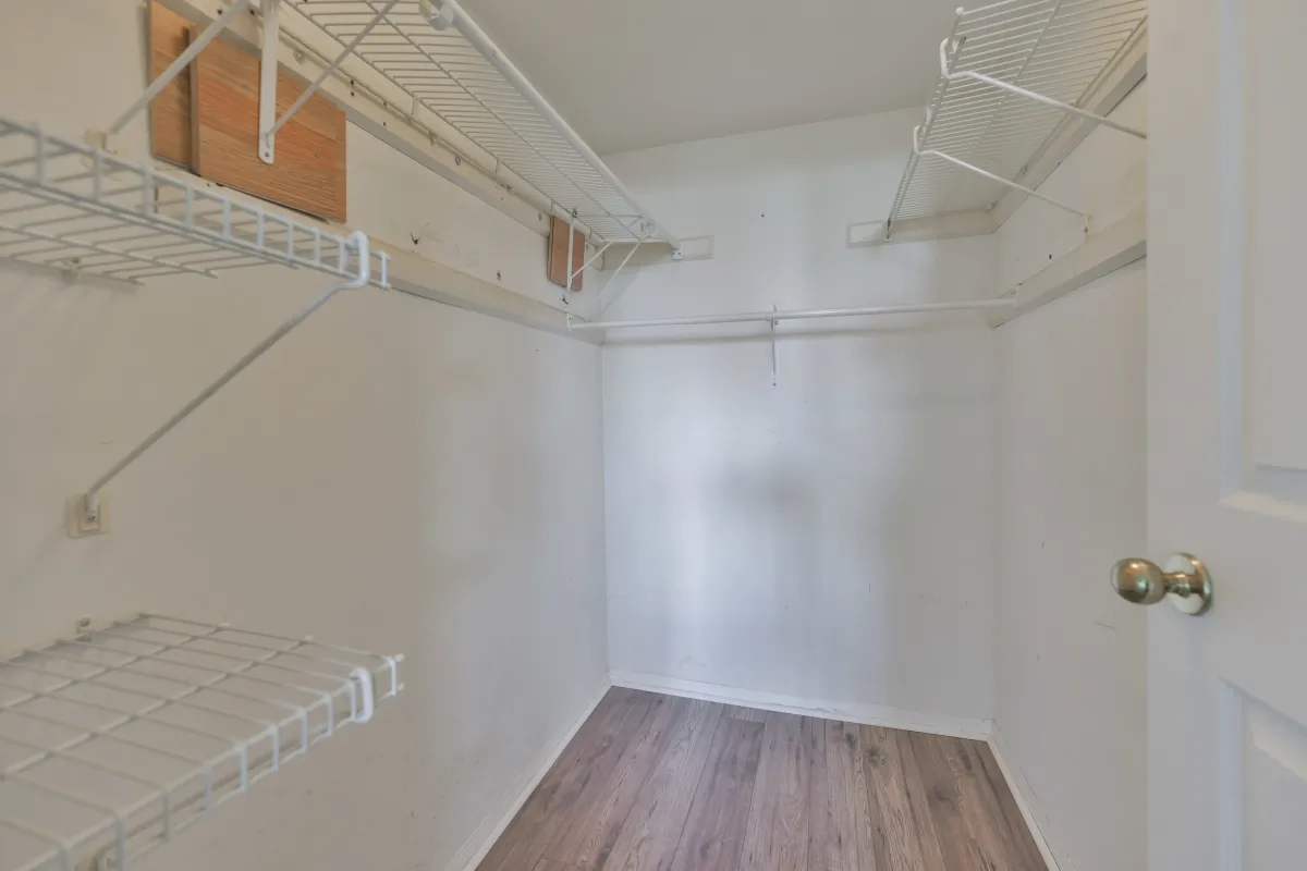 Walk-in closet in primary bedroom