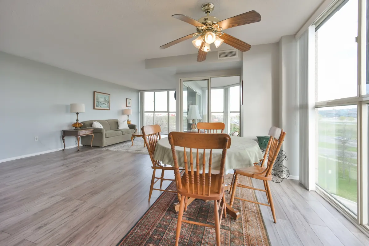 Spacious dining area perfect for family meals in a Riverpark condominium unit.