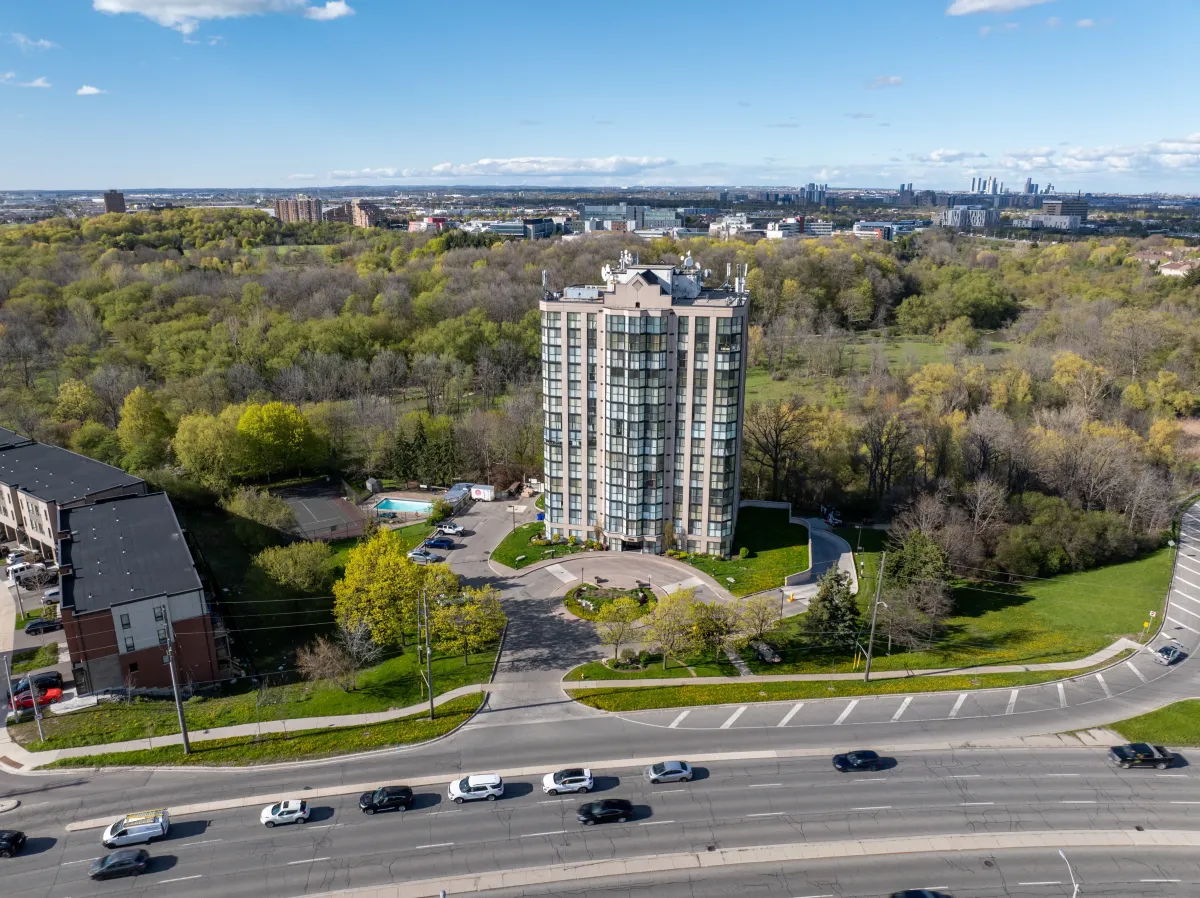 Aerial view of 600 Rexdale Blvd building surrounded by green space in Etobicoke.