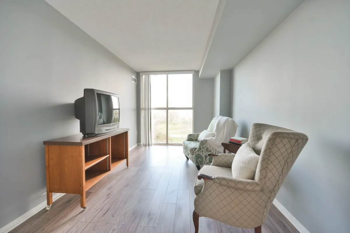 Bright second bedroom with large windows at 600 Rexdale Blvd.