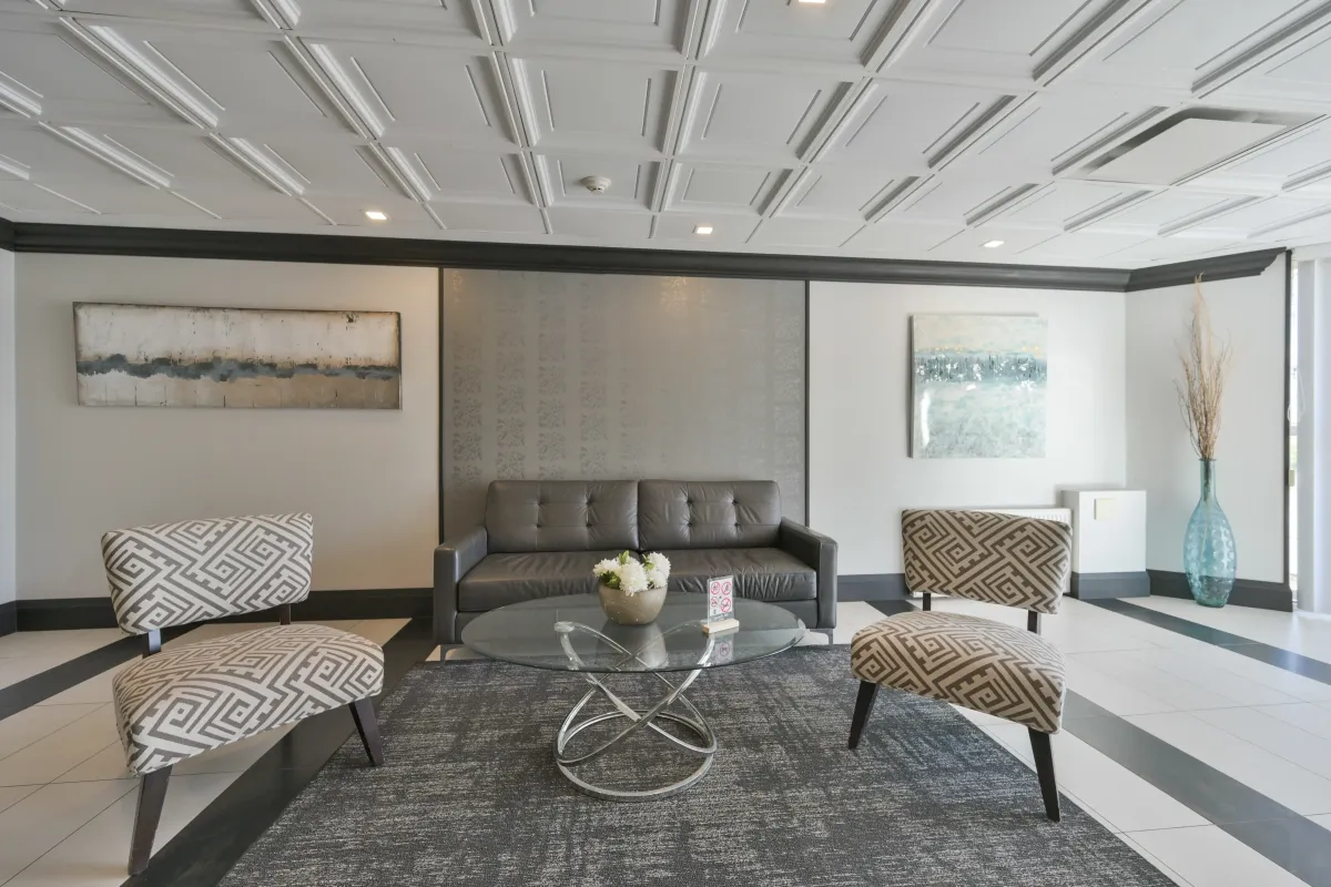 Elegant lobby seating area with modern furniture at Riverpark Condos.