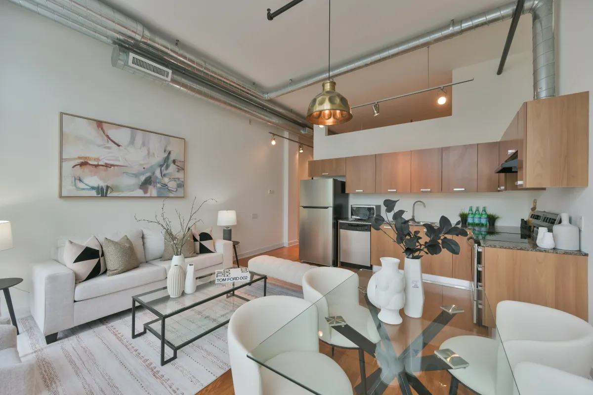 Alternative angle of the kitchen and main living area in the loft at 61843 Hanna Ave.