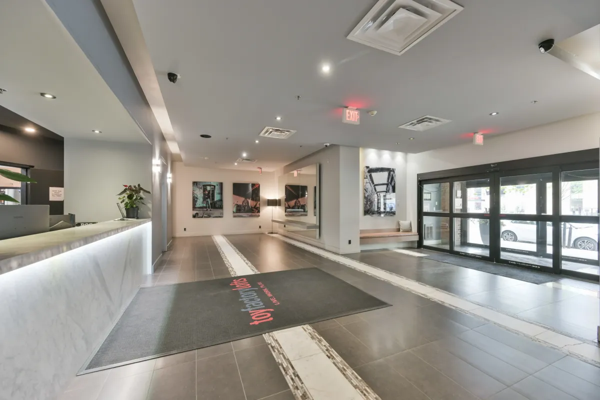 Clean and modern front reception lobby area inside 61843 Hanna Ave.