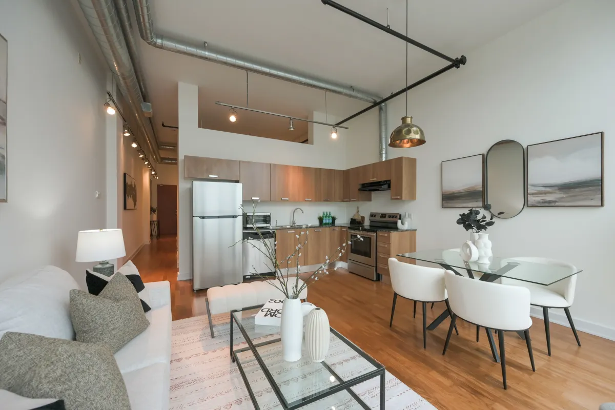 View from the living area looking toward the kitchen and dining space at 61843 Hanna Ave.