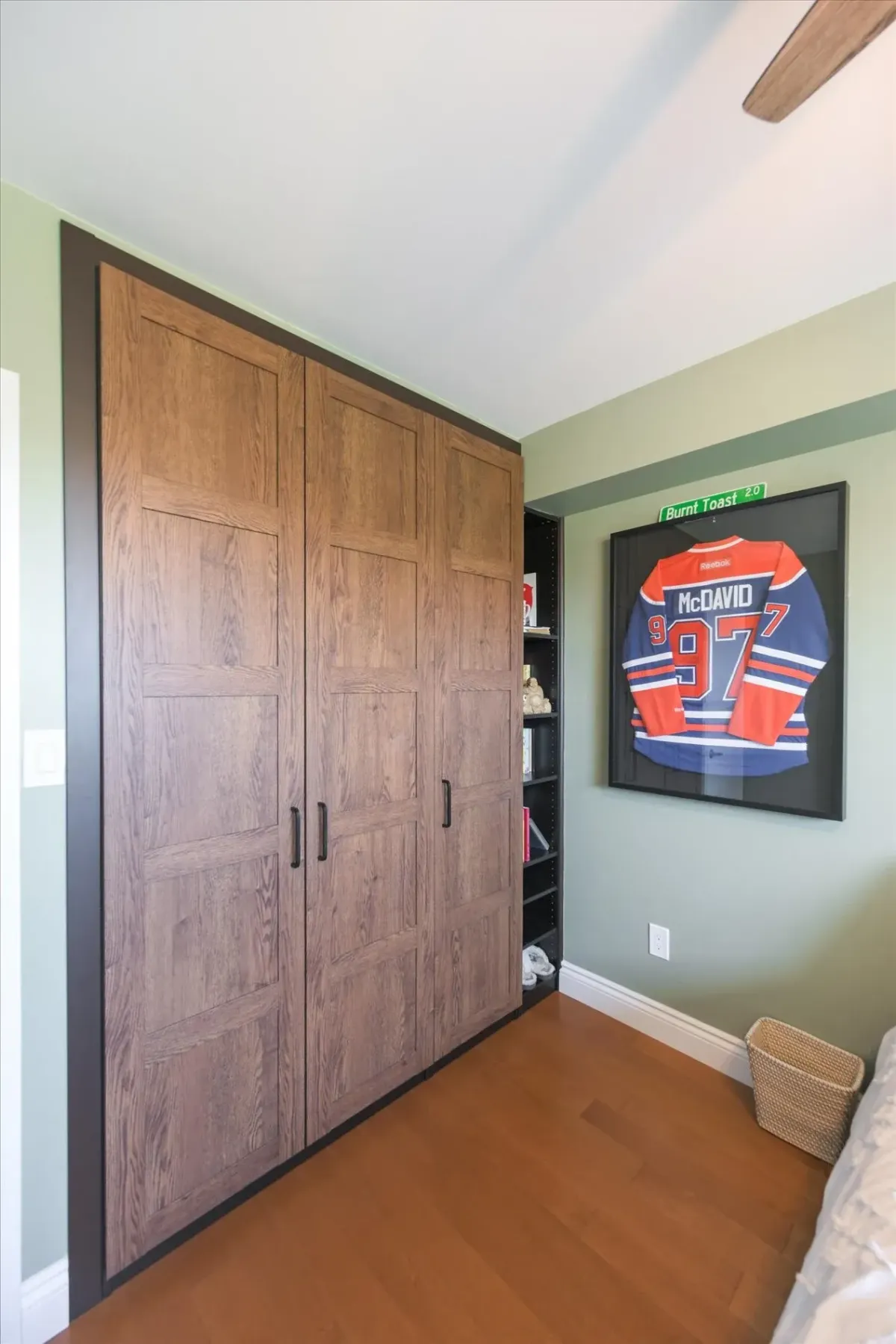 Upper perspective of the flush-mount wood wardrobe closet and smooth ceiling in 240 Scarlett Rd #912.