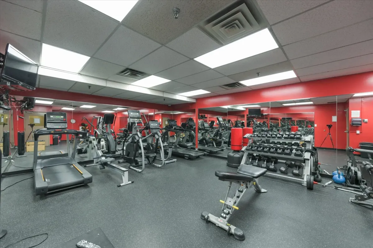 Fully equipped resident-only fitness center and gym facility located within the building amenities at 240 Scarlett Rd #912.
